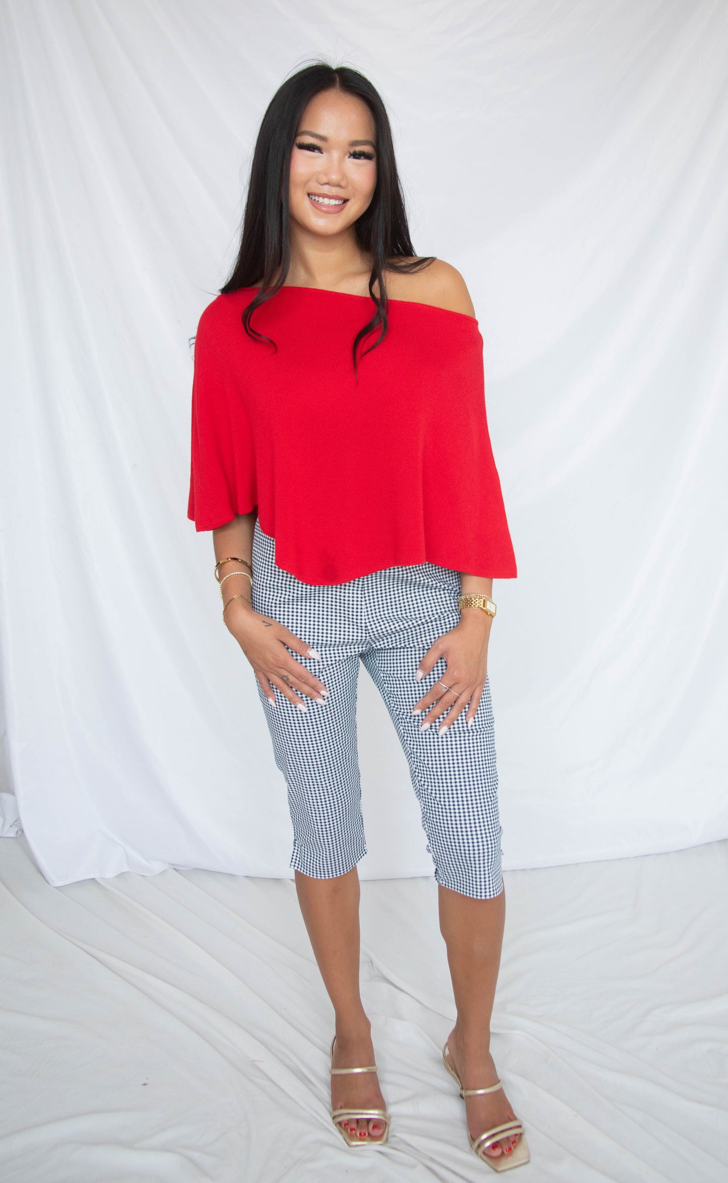 seeing red poncho knit top